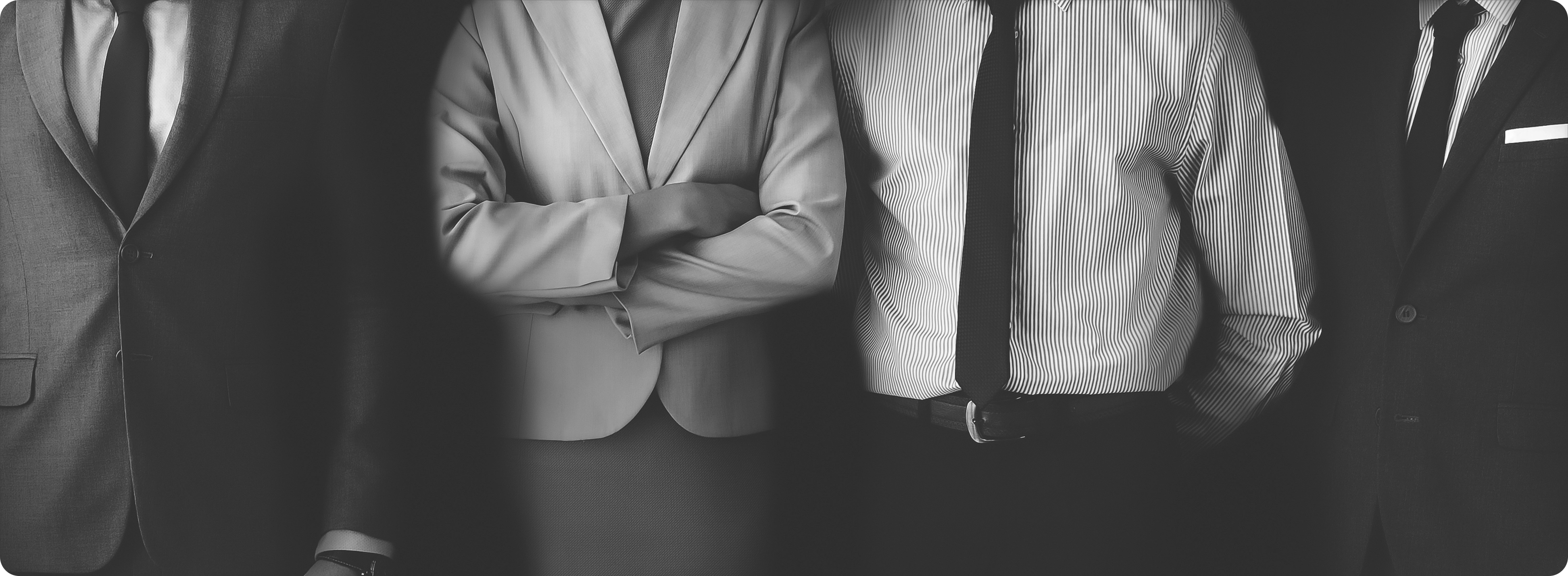 Enrich Money team members standing together at work